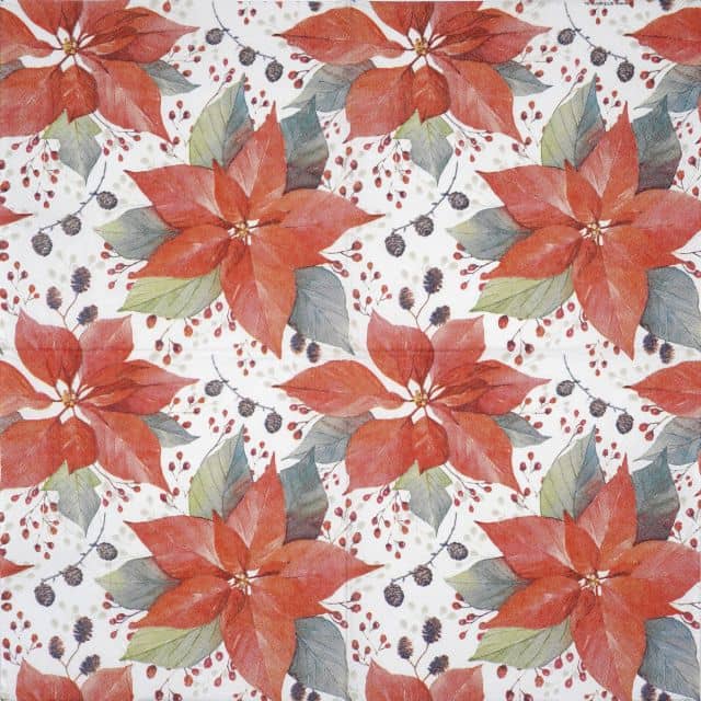 Decoupage napkin featuring a dense, repeating pattern of red poinsettias with green and blue-grey leaves, scattered among small red berries and dark pine cones, all on a white background.