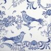 Close-up of folded Porcelain Bird cocktail napkin showing a detailed blue bird among blue floral accents on a crisp white background.