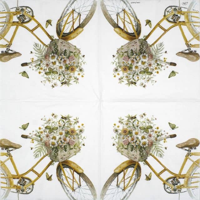 Decoupage napkin featuring four symmetrically arranged vintage-style yellow bicycles with baskets overflowing with white and pink flowers, surrounded by small butterflies, on a white background.