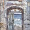 Vintage-inspired decoupage rice paper featuring a distressed blue and beige background with layered textures, including old script, a weathered brick wall, and two wooden oars, with an open arched doorway revealing a stormy ocean and crashing waves.