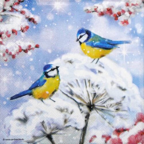 Quarter view of a festive napkin featuring various winter birds, such as robins and blue tits, perched among snowy branches with red berries. Ideal for decoupage and holiday table décor.