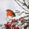 Winter-themed decoupage napkin featuring a vibrant red-breasted robin perched on a snow-covered branch adorned with red berries, with snowflakes falling in the background. Quarter of the napkin.