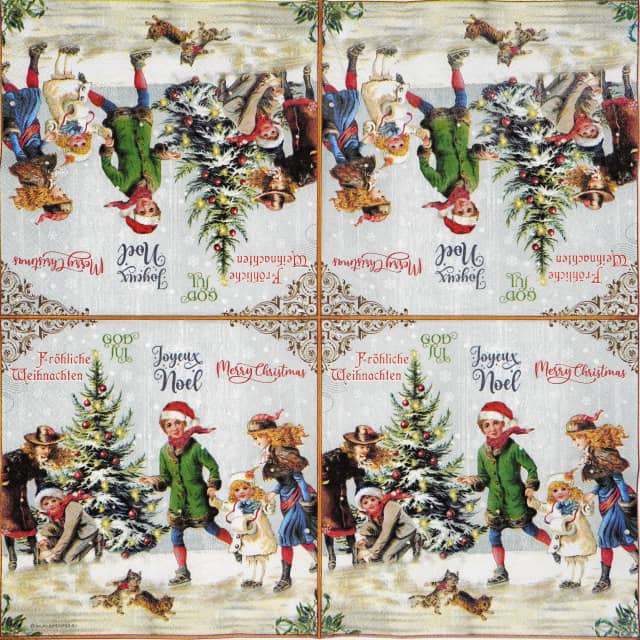 Nostalgic Christmas decoupage napkin featuring children and playful kittens ice skating around a festive Christmas tree, with holiday greetings in various languages across the top border. Unfolded napkin.