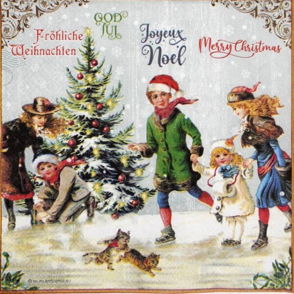 Nostalgic Christmas decoupage napkin featuring children and playful kittens ice skating around a festive Christmas tree, with holiday greetings in various languages across the top border. Quarter of the napkin.