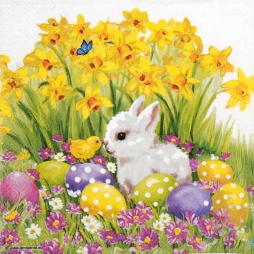 Folded Ambiente 'Easter Friends' napkin featuring a fluffy white rabbit and a small yellow chick sitting among yellow daffodils and brightly colored Easter eggs.